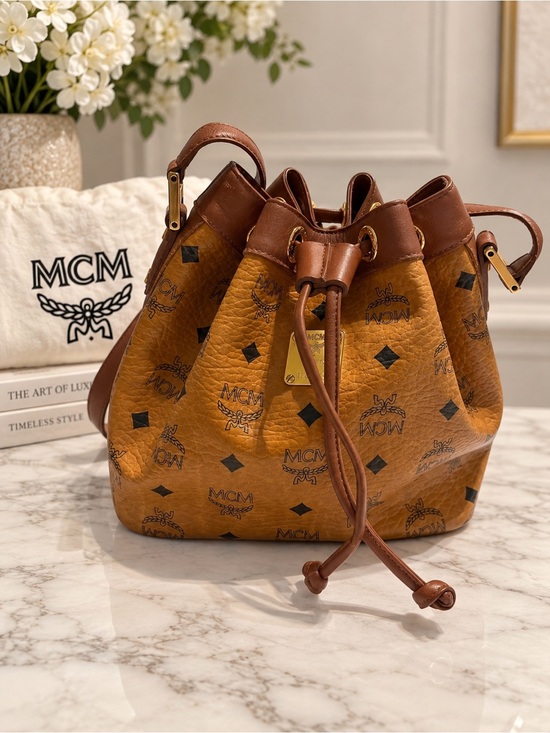 MCM Handbags - Vintage MCM Cognac Visetos Drawstring Bucket Bag w/ Dust Bag